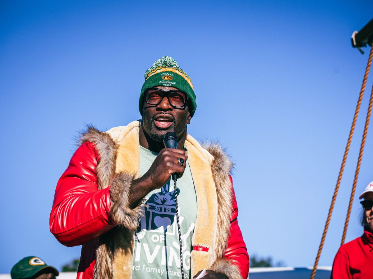 Photos: WWE star Titus O’Neil gives 5,000 presents to Tampa families